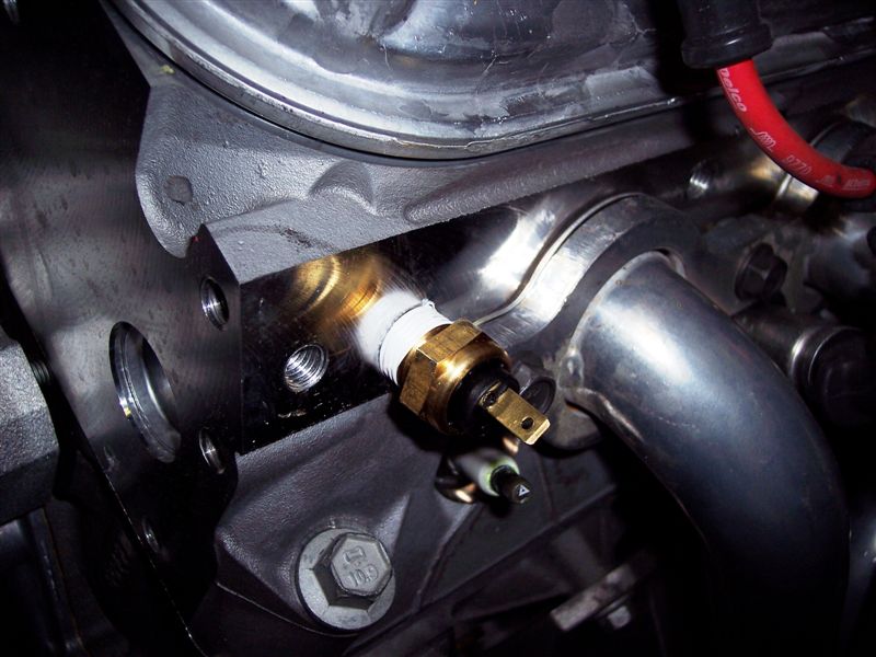 Simply screw the '85 coolant sender into the cylinder head so your original gauges will work accurately.