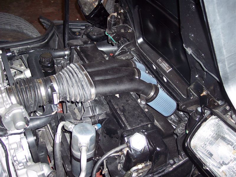 An aftermarket C5 air intake & air cleaner works fine to connect the LS2 to fresh air.