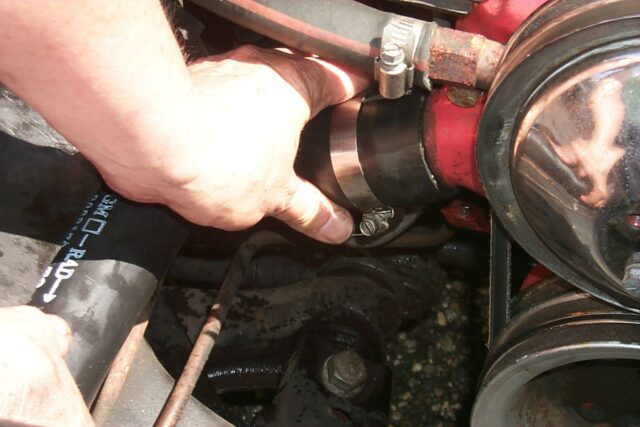 Attach Lower Radiator Hose to Water Pump Outlet